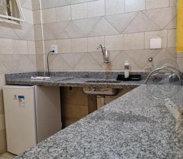 Sao Joao Batista do Gloria Apartment | Suíte privativa com ar-condicionado e garagem