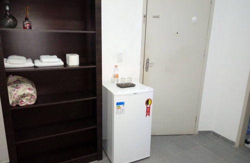 Vila Santa Rosa House | Suite for rent in Guarujá - sleeps 2 - mini-fridge + ceiling fan