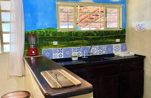 Alto Paraiso de Goias House | The Cosmic Refuge accommodates up to 22 people with a jacuzzi included in the price of the stay.
