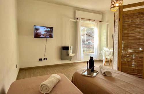 Monte Grande Apartment | Travel Suites MG Céntrico - Airport 15 min - Clínica MG - Parking Ezeiza