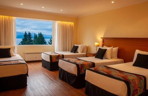 San Carlos de Bariloche Hotel | Triple Lake View Stay | Free Breakfast & Onsite Spa | 0.3 Mi to Playa Melipal