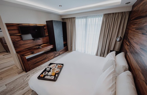 Rio Cuarto Hotel | Unwind in a Nature-Inspired Room with Balcony Views | 0.7 mi to Cathedral Church
