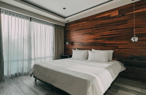 Rio Cuarto Hotel | Unwind in a Nature-Inspired Room with Balcony Views | 0.7 mi to Cathedral Church