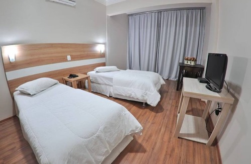 Centro Hotel | Walk to Bella Citta Shopping From This Downtown Solo Retreat