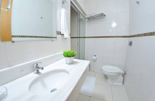 Centro Hotel | Walk to Bella Citta Shopping From This Downtown Solo Retreat