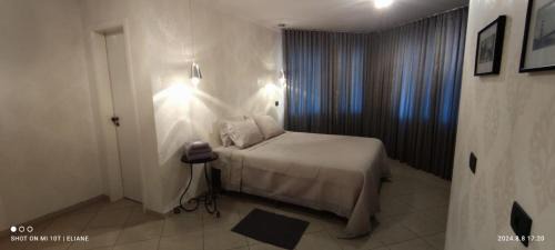 A melhor acomodação entre Pinhais e Curitiba - quarto para até O4 pessoas em casa com garagem
