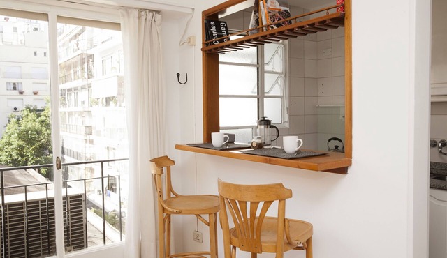 Bright 1 BR apartment with full kitchen, dining, living area with full bathroom.