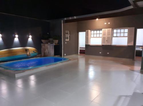 Casa com piscina, confortável e ótima localização
