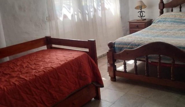Casa con bajada al rio