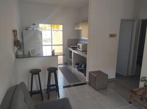 Casa cond fechado com Piscina diária grátis in Itanhaém