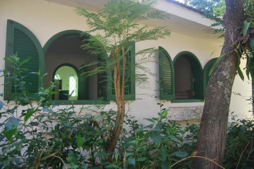 Casinha Radicais Natureza quintal com cachoeira