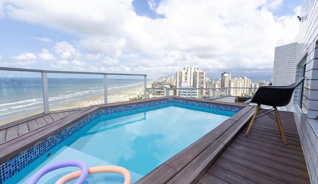 Cobertura a beira mar com piscina e churrasqueira
