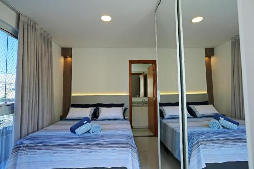 Cobertura Duplex no Campeche Florianópolis, 2 quartos com ar-condicionado, 3 banheiros, WiFi 1Gb, Cozinha completa, Estacionamento, Amplo terraço coberto com churrasqueira in Florianópolis