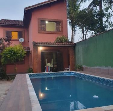 Com piscina em Praia in Itanhaém