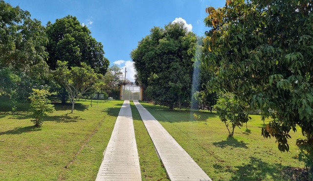 Country house in Atibaia with pool and game tables near the center.