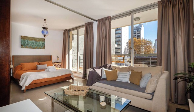 Designer apartment just steps from the Movistar Arena, with a balcony and a pool