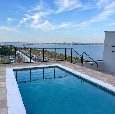 Edificio Paraná Playa Costanera, Apartamento de 1 Habitación, vista frontal al Rio con parking y Amenities! in Encarnación