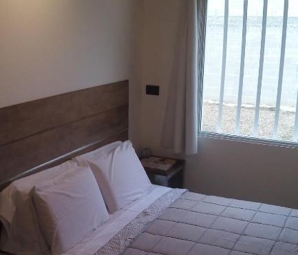 El Pueblo Aparts - Rada Tilly