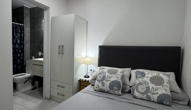 Equipped apartment - In front of the square and close to downtown