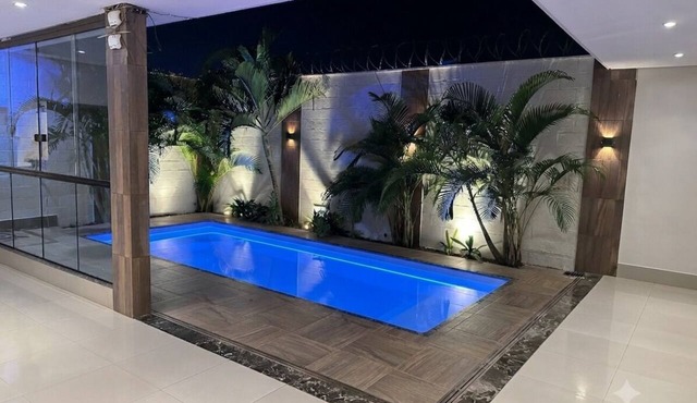 Guesthouse with pool and gourmet area, great location.