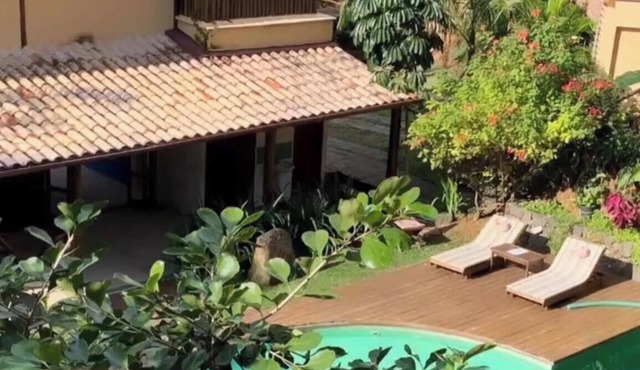 House on Curral beach in Ilhabela, with pool and barbecue. Two suites.
