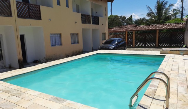 House with a pool and barbecue in Caraguatatuba, located in a gated community with Wi-Fi. in SP