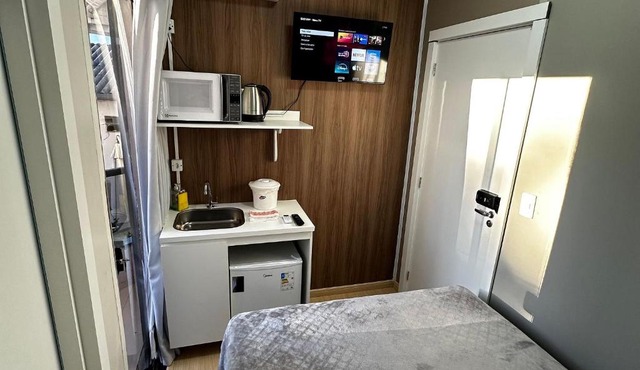 Loft Lux SM Chapecó | Conforto e Praticidade com Ar, Cozinha e Smart TV