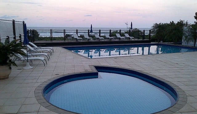 Luxurious Sea Front Duplex with Resort structure in gated community.
