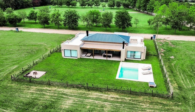 Luxury retreat: Modern house with garden and pool