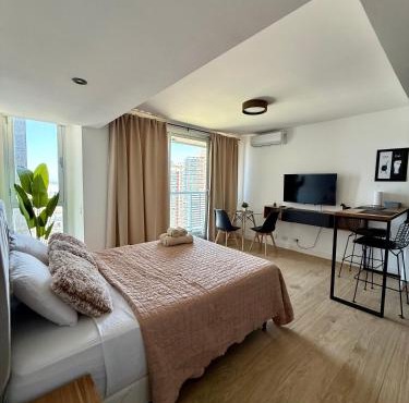MarDelSuites - Studios Modernos Piso Alto - Vista al Mar, Cochera Opcional, AC, Pileta, 2min Playa
