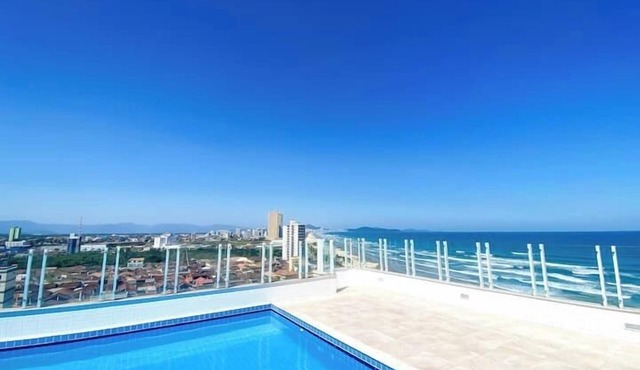 Pé na areia apto c vista mar e piscina