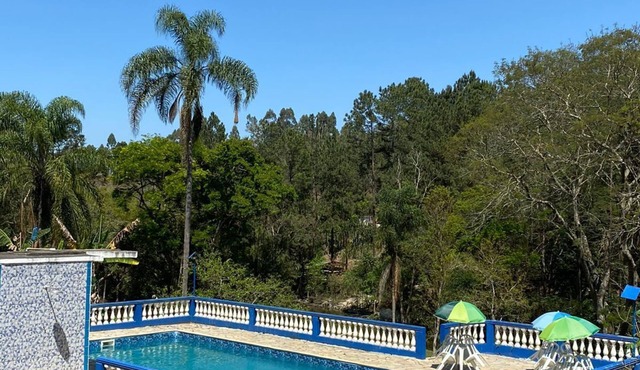 Property with swimming pool, soccer field, Wi-Fi, and a lake with many fish.