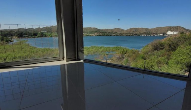 Punta El Tesoro - Playa Privada al Lago