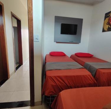 Quarto Triplo Comercial - Queen's Hotel