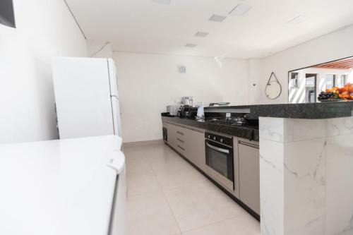 Sua Casa Perfeita c/4 Suítes e Piscina Aquecida in Caldas Novas