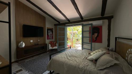 Suite com jardim privativo - Casa das Bromélias - 02 in Araras Petropolis