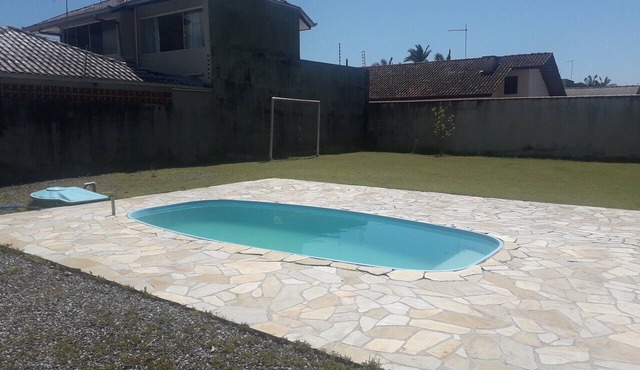 Two-story house with pool and small soccer field in Itapoá-SC