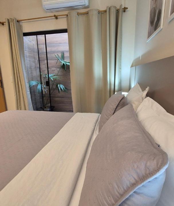 Triangulo Apartment | Apto inteiro novo 5 min do shopping Wi-Fi e vaga