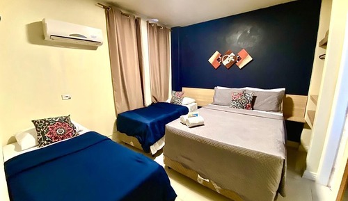 Quarto Quádruplo Premium