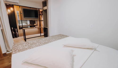Apartamento triplo solteiro