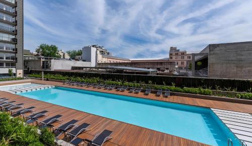One-Bedroom Apartment with Balcony and City View