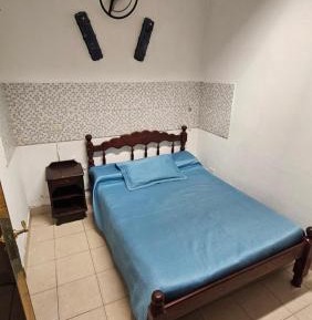 Basic Triple Room with Shared Bathroom