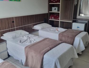 Triple Room ( 3 single beds)