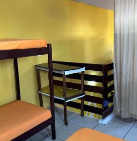 Single Bed in Dormitory Room