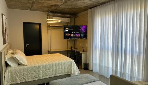 One-Bedroom Apartment with Balcony and City View