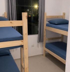Single Bed in Male Dormitory Room with Shared Bathroom