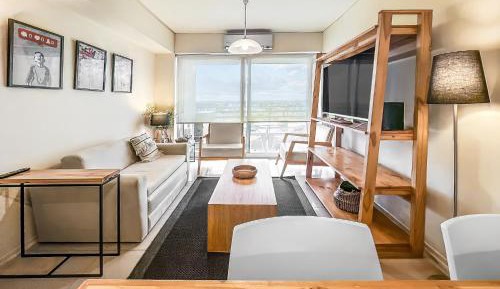 One-Bedroom Apartment with Balcony and City View