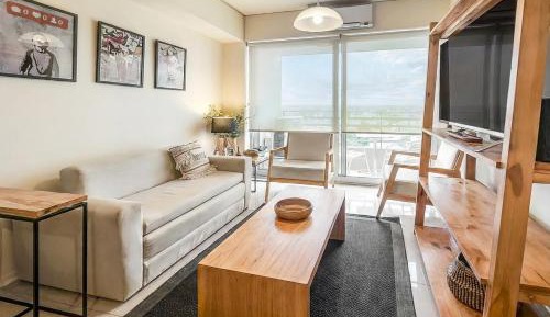 One-Bedroom Apartment with Balcony and City View