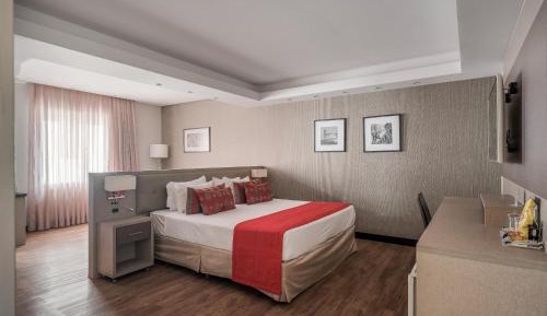 Premium Suite Triple with double bed