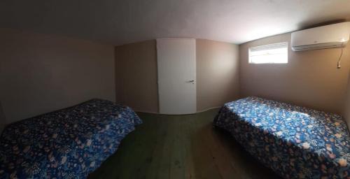 Single Bed in Dormitory Room